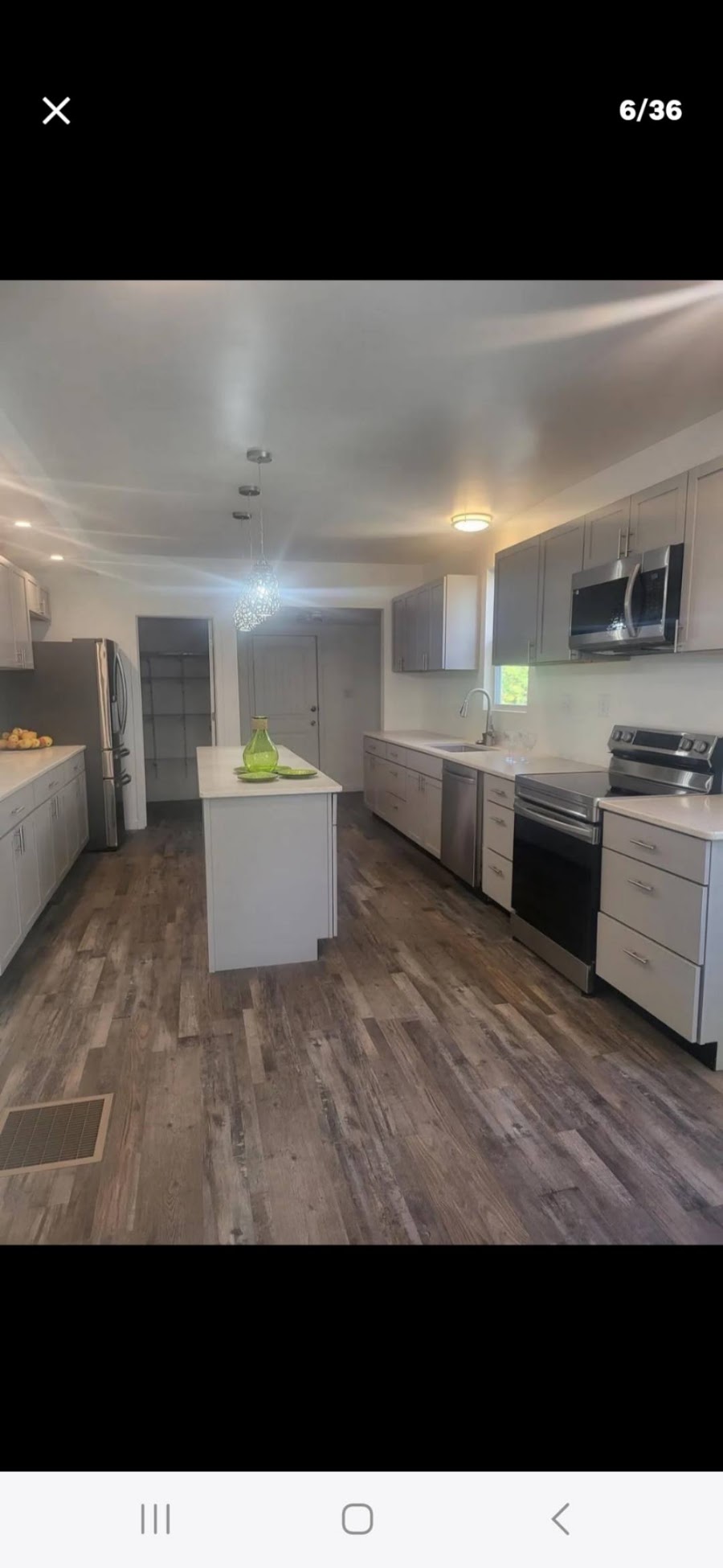 Kitchen remodel with island by C.E. Enterprises